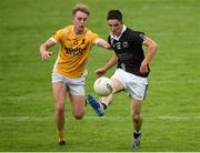 9 August 2020; Alan McCahey of Magheracloone Mitchell's in action against Dean McDonnell of Clontibret O'Neills during the Monaghan Senior Football Championship Group 1 Round 3 match between Clontibret O'Neills and Magheracloone Mitchell's at Clontibret O'Neills GAA Club in Clontibret, Monaghan. Photo by Philip Fitzpatrick/Sportsfile