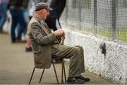 9 August 2020; Clontibret O'Neills supporter Benny Carraher watches on during the Monaghan Senior Football Championship Group 1 Round 3 match between Clontibret O'Neills and Magheracloone Mitchell's at Clontibret O'Neills GAA Club in Clontibret, Monaghan. Photo by Philip Fitzpatrick/Sportsfile