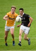 9 August 2020; Alan McCahey of Magheracloone Mitchell's in action against Dean McDonnell of Clontibret O'Neills during the Monaghan Senior Football Championship Group 1 Round 3 match between Clontibret O'Neills and Magheracloone Mitchell's at Clontibret O'Neills GAA Club in Clontibret, Monaghan. Photo by Philip Fitzpatrick/Sportsfile