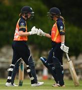 9 August 2020; Sophie MacMahon, left, and Leah Paul of Scorchers bump gloves during the Women's Super Series match between Scorchers and Typhoons at Pembroke Cricket Club in Park Avenue, Dublin. Photo by Sam Barnes/Sportsfile