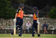 9 August 2020; Gaby Lewis, left, and Leah Paul of Scorchers bump fists during the Women's Super Series match between Scorchers and Typhoons at Pembroke Cricket Club in Park Avenue, Dublin. Photo by Sam Barnes/Sportsfile