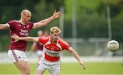 9 August 2020; David Garland of Donaghmoyne in action against Ciarán Galligan of Ballybay during the Monaghan Senior Football Championship Group 1 Round 3 match between Ballybay and Donaghmoyne at Ballybay Pearse Brothers GAA Club in Ballybay, Monaghan. Photo by Philip Fitzpatrick/Sportsfile