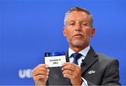 9 August 2020; UEFA Head of Club Competitions Michael Heselschwerdt draws out the name of Dundalk FC during the UEFA Champions League 2020/21 First Qualifying Round Draw at the UEFA Headquarters, The House of European Football in Nyon, Switzerland. Photo by UEFA via Sportsfile