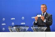9 August 2020; UEFA Head of Club Competitions Michael Heselschwerdt draws out the name of Dundalk FC during the UEFA Champions League 2020/21 First Qualifying Round Draw at the UEFA Headquarters, The House of European Football in Nyon, Switzerland. Photo by UEFA via Sportsfile