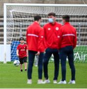 10 August 2020; Adam McGill, age 6, watches the St Patrick's Athletic players prior to the Extra.ie FAI Cup First Round match between Finn Harps and St. Patrick's Athletic at Finn Park in Ballybofey, Donegal. Photo by Stephen McCarthy/Sportsfile