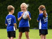 14 August 2020; Darcie Bailey, age 7 , with William Langrell, age 7, and Lauren O'Leary, age 8, during the Bank of Ireland Leinster Rugby Summer Camp at Gorey in Wexford. Photo by Matt Browne/Sportsfile