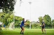 15 August 2020; Jonny Cooper, left, and Eoin Murchan of Na Fianna warm up prior to the Dublin County Senior 1 Football Championship Group 2 Round 3 match between Na Fianna and Ballinteer St Johns at Balgriffin in Dublin. Photo by David Fitzgerald/Sportsfile