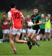 15 August 2020; Stephen Cluxton of Parnells sets up an attack as Niall James of Cuala closes in during the Dublin County Senior 2 Football Championship Group 2 Round 3 match between Cuala and Parnells at Hyde Park in Glenageary, Dublin. Photo by Piaras Ó Mídheach/Sportsfile