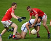 15 August 2020; Eamon Fennell of St Vincent's in action against Morgan Walsh, left, and Andy Foley of Clontarf during the Dublin County Senior 1 Football Championship Group 3 Round 3 match between Clontarf and St. Vincent's at Parnell Park in Dublin. Photo by Ramsey Cardy/Sportsfile