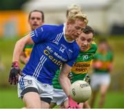 16 August 2020; Kieran Hughes of Scotstown in action against Brian Flanagan of Castleblayney Faughs during the Monaghan County Senior Football Championship Group 2 Round 4 match between Castleblayney Faughs and Scotstown at St Mary's Park in Castleblayney, Monaghan. Photo by Philip Fitzpatrick/Sportsfile