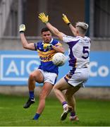 16 August 2020; Ben Galvin of Castleknock has his shot blocked by Cian O'Connor of Kilmacud Crokes during the Dublin County Senior Football Championship Round 3 match between Kilmacud Crokes and Castleknock at Parnell Park in Dublin. Photo by Sam Barnes/Sportsfile