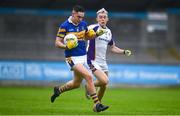 16 August 2020; Darragh Warnock of Castleknock in action against Cian O'Connor of Kilmacud Crokes during the Dublin County Senior Football Championship Round 3 match between Kilmacud Crokes and Castleknock at Parnell Park in Dublin. Photo by Sam Barnes/Sportsfile