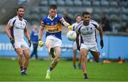 16 August 2020; Seamus O'Carroll of Castleknock kicks a point under pressure from Craig Dias of Kilmacud Crokes during the Dublin County Senior Football Championship Round 3 match between Kilmacud Crokes and Castleknock at Parnell Park in Dublin. Photo by Sam Barnes/Sportsfile