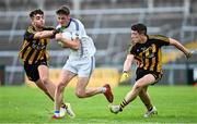 16 August 2020; Ronan Mac Donnacha of Mícheál Breathnachs is tackled by James Foley, left, and Mark Mannion of Mountbellew/Moylough during the Galway County Senior Football Championship Group 2 match between Mícheál Breathnachs and Mountbellew/Moyloug at Pearse Stadium in Galway. Photo by Ramsey Cardy/Sportsfile