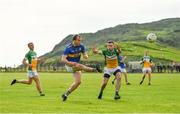 16 August 2020; Ciaran McGinley of Kilcar kicks a point under pressure from Ruairi Crawford of Glenswilly during the Donegal County Senior Football Championship Round 1 match between Kilcar and Glenswilly at Towney Park in Kilcar, Donegal. Photo by Seb Daly/Sportsfile