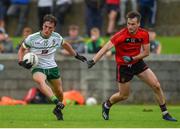 16 August 2020; Donnach Swinburne of Carrickmacross Emmets in action against Adam Treanor of Truagh during the Monaghan County Senior Football Championship Group 2 Round 4 match between Carrickmacross Emmets and Truagh at Carrickmacross Emmets GAC in Carrickmacross, Monaghan. Photo by Philip Fitzpatrick/Sportsfile