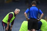 16 August 2020; Borris-Ileigh manager Johnny Kelly in conversation with referee Seán Lonergan as Jerry Kelly of Borris-Ileigh receives attention for an injury during the Tipperary County Senior Hurling Championship Group 4 Round 3 match between Borris-Ileigh and Upperchurch-Drombane at Semple Stadium in Thurles, Tipperary. Photo by Piaras Ó Mídheach/Sportsfile