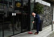 16 August 2020; The Croke Park Hotel general manager Alan Smullen sweeps up outside the door of his hotel on the original scheduled date of the 2020 GAA Hurling All-Ireland Senior Championship Final. Due to current restrictions laid down by the Irish government to prevent the spread of coronavirus, the dates for the staging of the GAA inter-county season have been pushed back, with the first round of games now due to start in October. The 2020 All-Ireland Senior Hurling Championship was due to be the 133rd staging of the All-Ireland Senior Hurling Championship, the Gaelic Athletic Association's premier inter-county hurling tournament, since its establishment in 1887. For the first time in 96 years the All-Ireland hurling final is now due to be played in December with the 2020 final due on Sunday, December 13th, the same weekend on which Dublin beat Galway in the 1924 final. Photo by Brendan Moran/Sportsfile