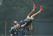 17 August 2020; Caelan Doris, lifted by Rónan Kelleher, during Leinster Rugby squad training at UCD in Dublin. Photo by Ramsey Cardy/Sportsfile