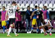 19 August 2020; David McMillan, left, and Nathan Oduwa of Dundalk following the UEFA Champions League First Qualifying Round match between NK Celja and Dundalk at Ferenc Szusza Stadion in Budapest, Hungary. Photo by Vid Ponikvar/Sportsfile