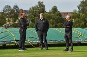 20 August 2020; Umpires Aidan Seaver, left, and Paul Reynolds, right, in conversation with match referee Kevin Gallagher prior to the 2020 Test Triangle Inter-Provincial Series match between Leinster Lightning and Munster Reds at Pembroke Cricket Club in Dublin. Photo by Seb Daly/Sportsfile