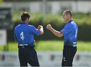 20 August 2020; Josh Little of Leinster Lightning, right, is congratulated by team-mate Tyrone Kane after running out Jeremy Lawlor of Munster Reds during the 2020 Test Triangle Inter-Provincial Series match between Leinster Lightning and Munster Reds at Pembroke Cricket Club in Dublin. Photo by Seb Daly/Sportsfile