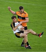 21 August 2020; Cillian Fitzgerald of Dr Crokes is tackled by Greg Horan of Austin Stacks during the Kerry County Senior Football Championship Round 1 match between Dr Crokes and Austin Stacks at Austin Stack Park in Tralee, Kerry. Photo by Brendan Moran/Sportsfile