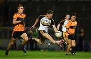 21 August 2020; Michael Potts of Dr Crokes solos through ahead of Dylan Casey of Austin Stacks before winning his side's second penalty during the Kerry County Senior Football Championship Round 1 match between Dr Crokes and Austin Stacks at Austin Stack Park in Tralee, Kerry. Photo by Brendan Moran/Sportsfile