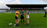 21 August 2020; Team captains Ronan Shanahan of Austin Stacks, left, and David O'Leary of Dr Crokes fist bump in the company of referee Jonathan Griffin prior to the Kerry County Senior Football Championship Round 1 match between Dr Crokes and Austin Stacks at Austin Stack Park in Tralee, Kerry. Photo by Brendan Moran/Sportsfile