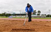22 August 2020; Official Shay Murphy rakes the sand whilst wearing PPE during the Women's Long Jump event on Day One of the Irish Life Health National Senior and U23 Athletics Championships at Morton Stadium in Santry, Dublin. Photo by Sam Barnes/Sportsfile