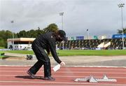 22 August 2020; Official Jacqueline Mulhall sanitises a set of blocks between races during Day One of the Irish Life Health National Senior and U23 Athletics Championships at Morton Stadium in Santry, Dublin. Photo by Sam Barnes/Sportsfile