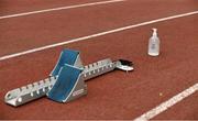 22 August 2020; Hand Sanitiser is seen beside a set of starting blocks during Day One of the Irish Life Health National Senior and U23 Athletics Championships at Morton Stadium in Santry, Dublin. Photo by Sam Barnes/Sportsfile