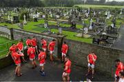 22 August 2020; The East Kerry team take a breather at half time next to the local graveyard during the Kerry County Senior Football Championship Round 1 match between Feale Rangers and East Kerry at Frank Sheehy Park in Listowel, Kerry. Photo by Brendan Moran/Sportsfile