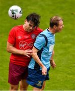 22 August 2020; Dean Kelly of St Mochtas in action against Sean Rogers of Killester Donnycarney during the New Balance FAI Intermediate Cup Final match between St Mochta's and Killester Donnycarney at Tallaght Stadium in Dublin. Photo by Eóin Noonan/Sportsfile