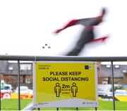22 August 2020; Covid-19 social distancing signage is seen during the warm up prior to the SSE Airtricity League Premier Division match between Bohemians and St Patrick's Athletic at Dalymount Park in Dublin. Photo by Stephen McCarthy/Sportsfile