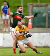 23 August 2020; Vincent Corey of Clontibret in action against Matthew McKenna of Inniskeen during the Monaghan County Senior Football Championship Group 1 Round 5 match between Clontibret O'Neills and Inniskeen at Clontibret in Monaghan. Photo by Philip Fitzpatrick/Sportsfile