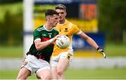 23 August 2020; Harry Monagan of Inniskeen in action against Francis Hughes of Clontibret during the Monaghan County Senior Football Championship Group 1 Round 5 match between Clontibret O'Neills and Inniskeen at Clontibret in Monaghan. Photo by Philip Fitzpatrick/Sportsfile