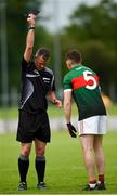 23 August 2020; Referee Colin Murphy issues a black card to Colm Meegan of Inniskeen during the Monaghan County Senior Football Championship Group 1 Round 5 match between Clontibret O'Neills and Inniskeen at Clontibret in Monaghan. Photo by Philip Fitzpatrick/Sportsfile