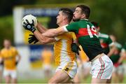 23 August 2020; Pauric Boyle of Clontibret in action against Matthew McKenna of Inniskeen during the Monaghan County Senior Football Championship Group 1 Round 5 match between Clontibret O'Neills and Inniskeen at Clontibret in Monaghan. Photo by Philip Fitzpatrick/Sportsfile