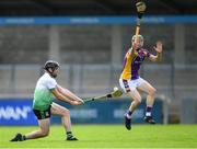23 August 2020; Ronan Smith of Lucan Sarsfields shoots under pressure from Fergal Whitely of Kilmacud Crokes during the Dublin County Senior A Hurling Championship Quarter-Final match between Kilmacud Crokes and Lucan Sarsfields at Parnell Park in Dublin. Photo by Piaras Ó Mídheach/Sportsfile