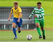 23 August 2020; Godwin Osiebe of Killarney Celtic in action against Anton Frank of Douglas Hall during the FAI Youth Cup Final match between Killarney Celtic and Douglas Hall at Mounthawk Park in Tralee, Kerry. Photo by Michael P Ryan/Sportsfile
