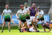 23 August 2020; Bill O'Carroll of Kilmacud Crokes tries to gather possession ahead of Ben Coffey of Lucan Sarsfields, 12, during the Dublin County Senior A Hurling Championship Quarter-Final match between Kilmacud Crokes and Lucan Sarsfields at Parnell Park in Dublin. Photo by Piaras Ó Mídheach/Sportsfile