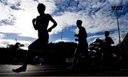 23 August 2020; John Travers of Donore Harriers, Dublin, left, leads from, Darragh McElhinney of U.C.D. AC, Dublin, centre, and Efrem Gidey of Clonliffe Harriers AC, Dublin, whilst competing in the Men's 5000m during Day Two of the Irish Life Health National Senior and U23 Athletics Championships at Morton Stadium in Santry, Dublin. Photo by Sam Barnes/Sportsfile