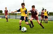 23 August 2020; Brian Ronan of Longford Town in action against Steven Jennings of Galway United during the SSE Airtricity U13 League Group 3 match between Galway United and Longford Town at Maree Oranmore Football Club in Oranmore, Galway. Photo by Diarmuid Greene/Sportsfile