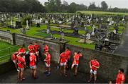 22 August 2020; The East Kerry team take a breather at half time next to the local graveyard during the Kerry County Senior Football Championship Round 1 match between Feale Rangers and East Kerry at Frank Sheehy Park in Listowel, Kerry. Photo by Brendan Moran/Sportsfile