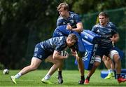 24 August 2020; Rory O'Loughlin is tackled by Charlie Ryan during Leinster Rugby squad training at UCD in Dublin. Photo by Ramsey Cardy/Sportsfile