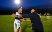 24 August 2020; Ballylinan manager Mick Lillis shakes hands with son and opposing player Kieran Lillis of Portlaoise during the Laois County Senior Football Championship Round 1 match between Ballylinan and Portlaoise GAA at Stradbally GAA in Stradbaly, Laois. Photo by David Fitzgerald/Sportsfile