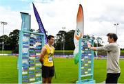 22 August 2020; Shane Howard of Bandon AC, Cork, is interviewed by Cathal Dennehy after winning the Men's Long Jump during Day One of the Irish Life Health National Senior and U23 Athletics Championships at Morton Stadium in Santry, Dublin. Photo by Sam Barnes/Sportsfile