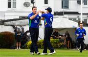 27 August 2020; Graham Hume, left, of North West Warriors celebrates with team-mate William Porterfield after taking the wicket of Curtis Campher of the Leinster Lightning during the 2020 Test Triangle Inter-Provincial Series match between Leinster Lightning and North West Warriors at Pembroke Cricket Club in Dublin. Photo by Matt Browne/Sportsfile