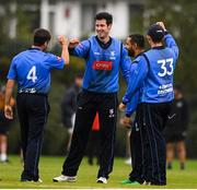 27 August 2020; George Dockrell of Leinster Lightning celebrates with his team-mates, from left, Tyrone Kane, Simi Singh and Stephen Doheny after taking the wicket of Will Smale during the 2020 Test Triangle Inter-Provincial Series match between Leinster Lightning and North West Warriors at Pembroke Cricket Club in Dublin. Photo by Matt Browne/Sportsfile